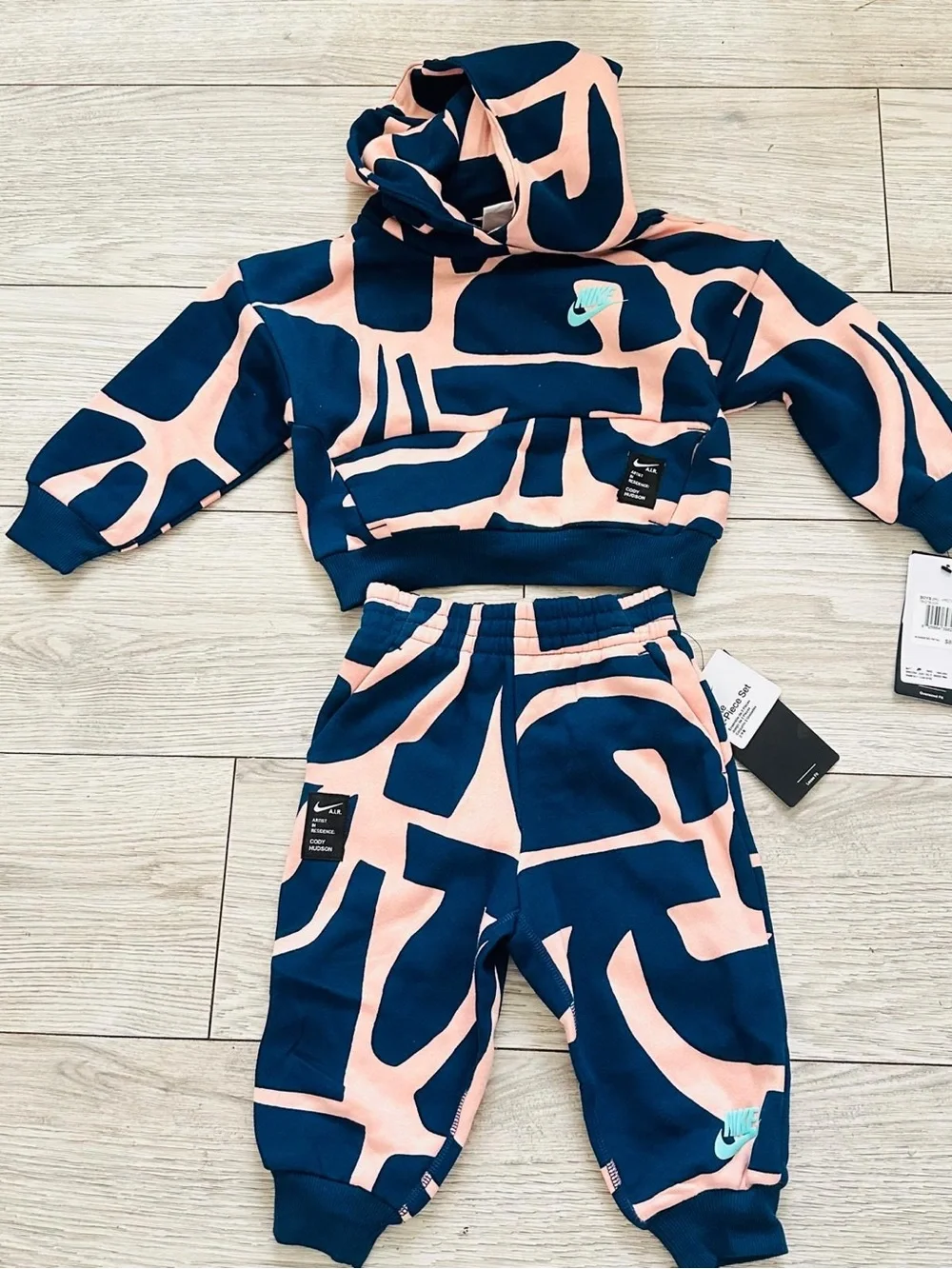 Nike Kids Abstract Print Sweatpants in Pink and Navy size T3